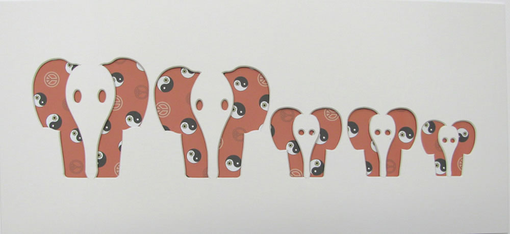picture of 5 front facing cut out elephants in a picture mount